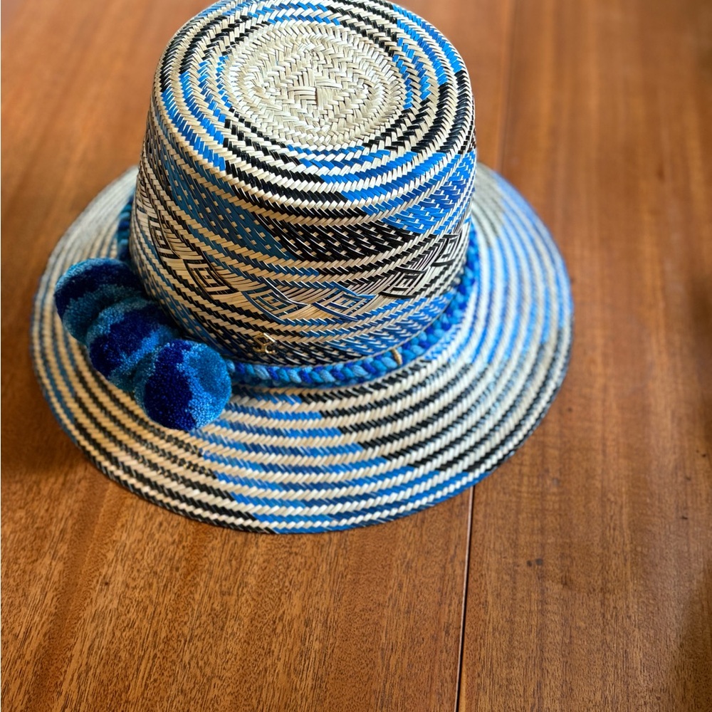 Yosuzi blue and black woven sun hat with blue pom poms